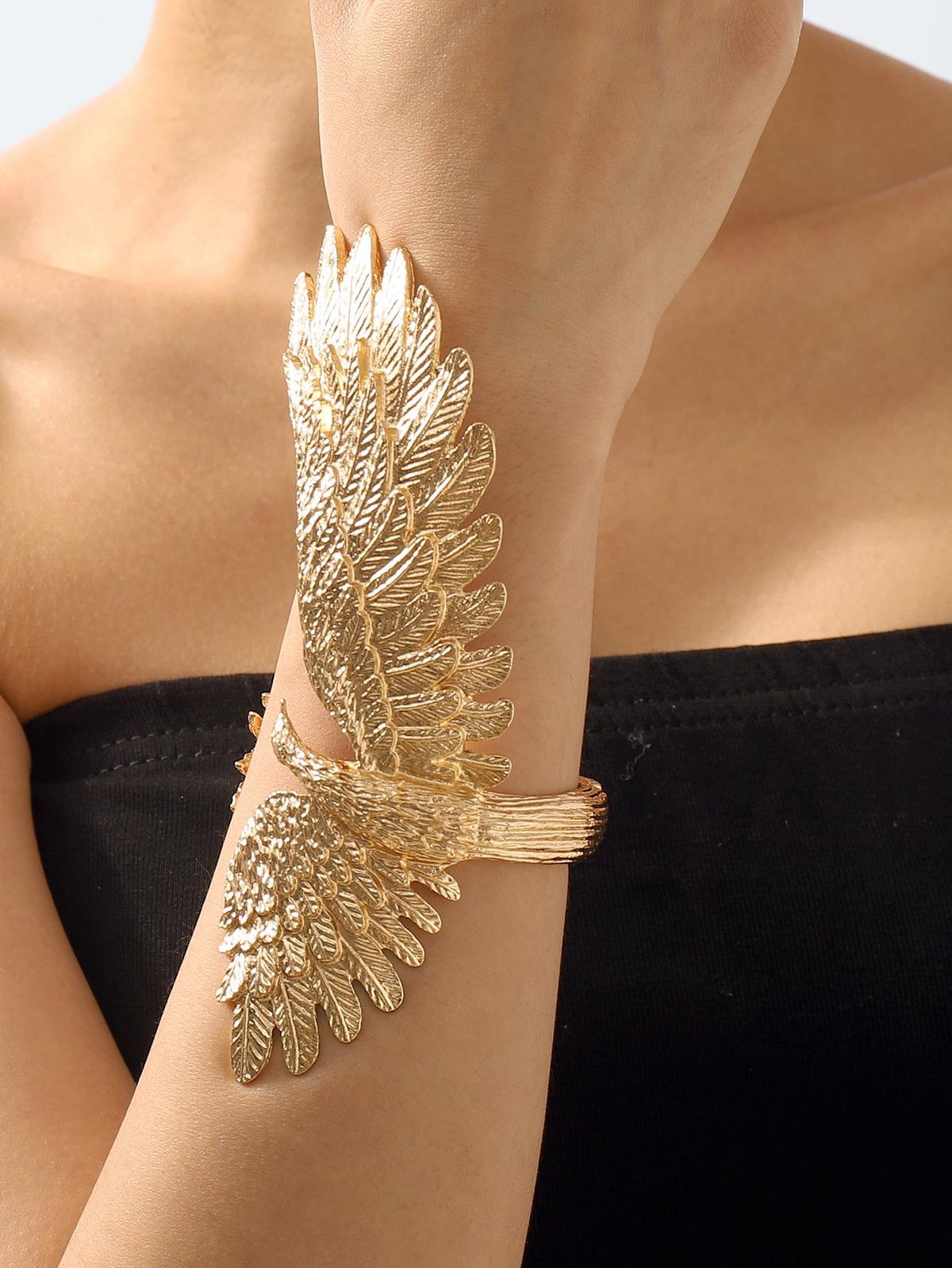 A winged gold cuff